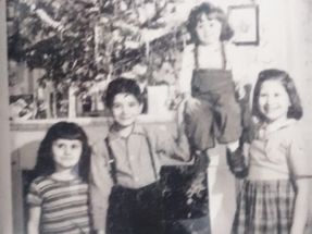 Here we are, my two sisters and my American cousin. Our first Christmas in America.