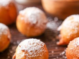 Zeppoles can be dusted with powdered sugar, or just plain. Serve and eat hot!