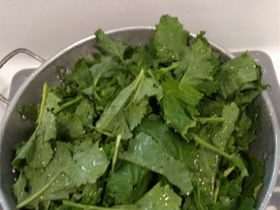 Cut and wash the rapini, drain in colander