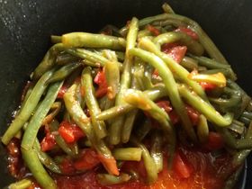 Delicious fresh stringbeans cooked with tomatoes and garlic.